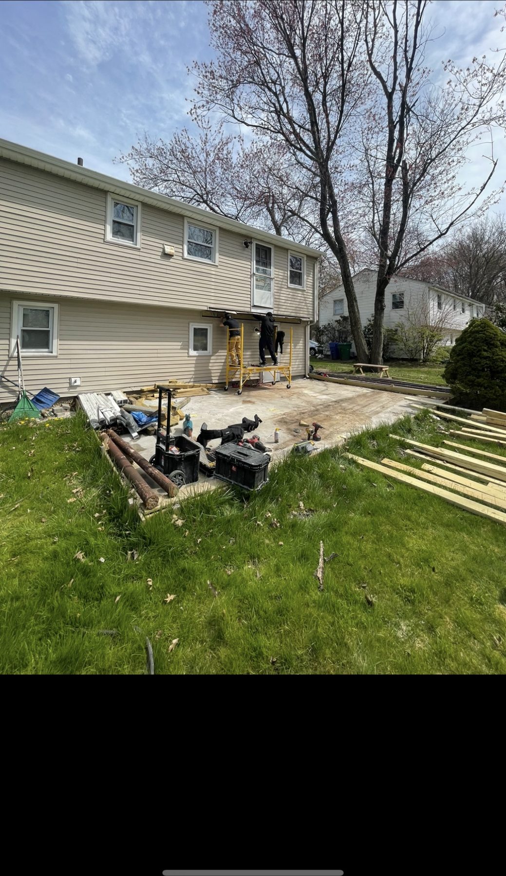 Backyard deck and patio project in early site preparation stages